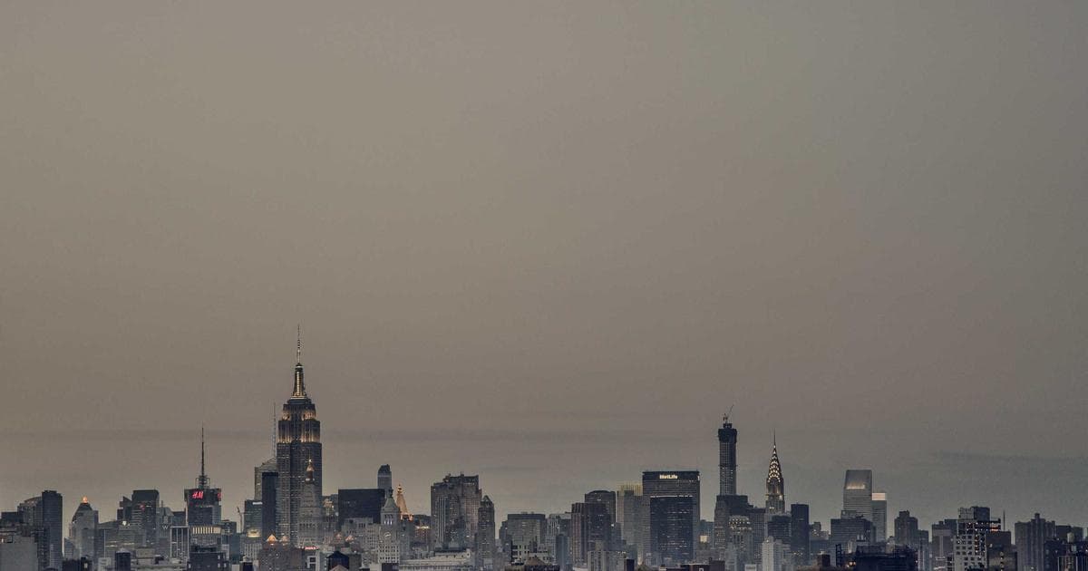 Computer vision system analyzing manufacturing quality inspection with bounding box detections and confidence scores overlaid on factory imagery