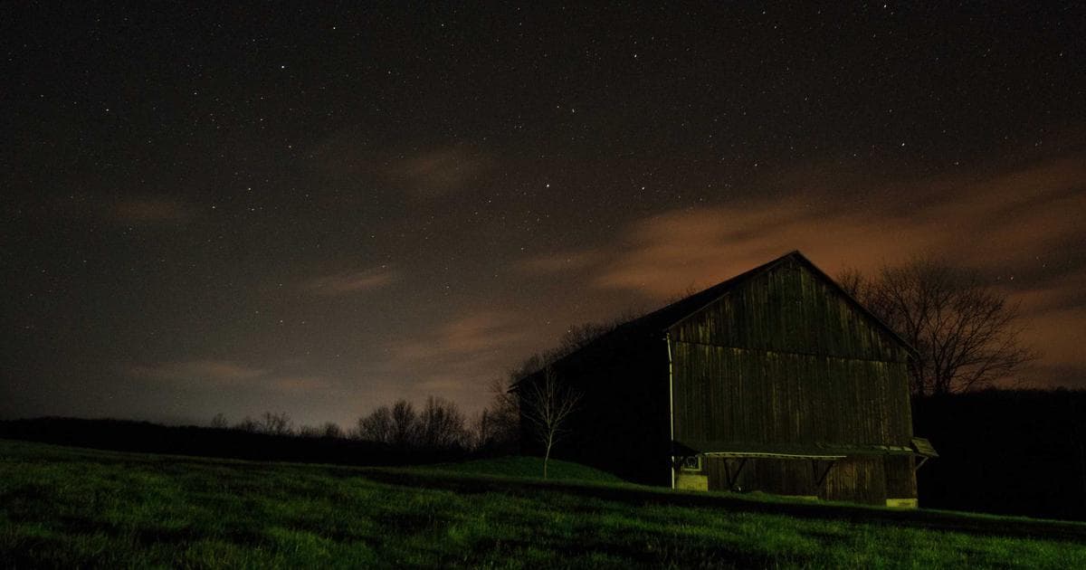Industrial landscape of Malaysian oil refinery and manufacturing plant with ERP system dashboard overlay
